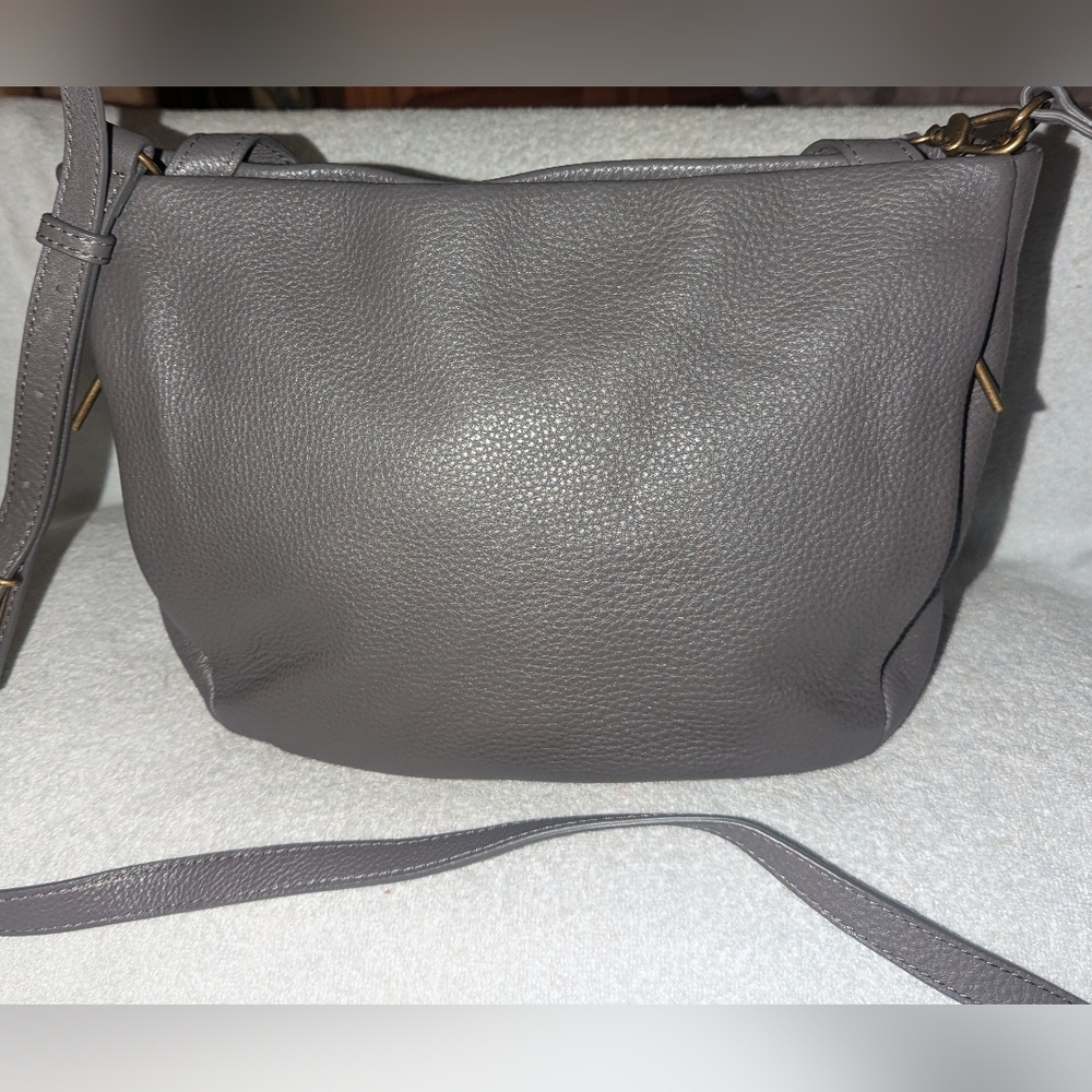 The Sak Collective Heritage gray leather shoulder bag.